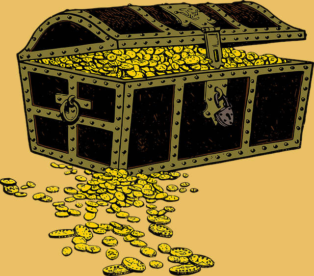Cofre del que sobresalen monedas de oro